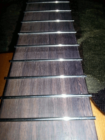 frets trimmed to board for filing